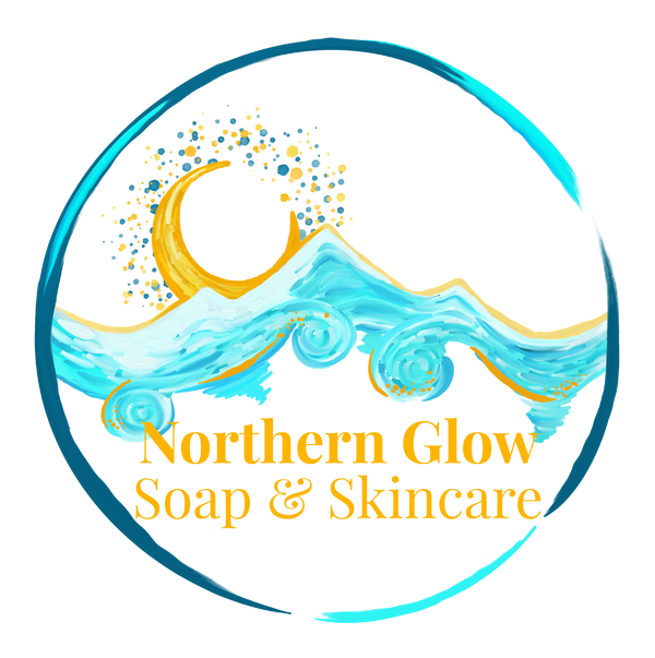 Northern Glow Soap and Skincare logo.  Image of blue mountains with a yellow crescent moon.