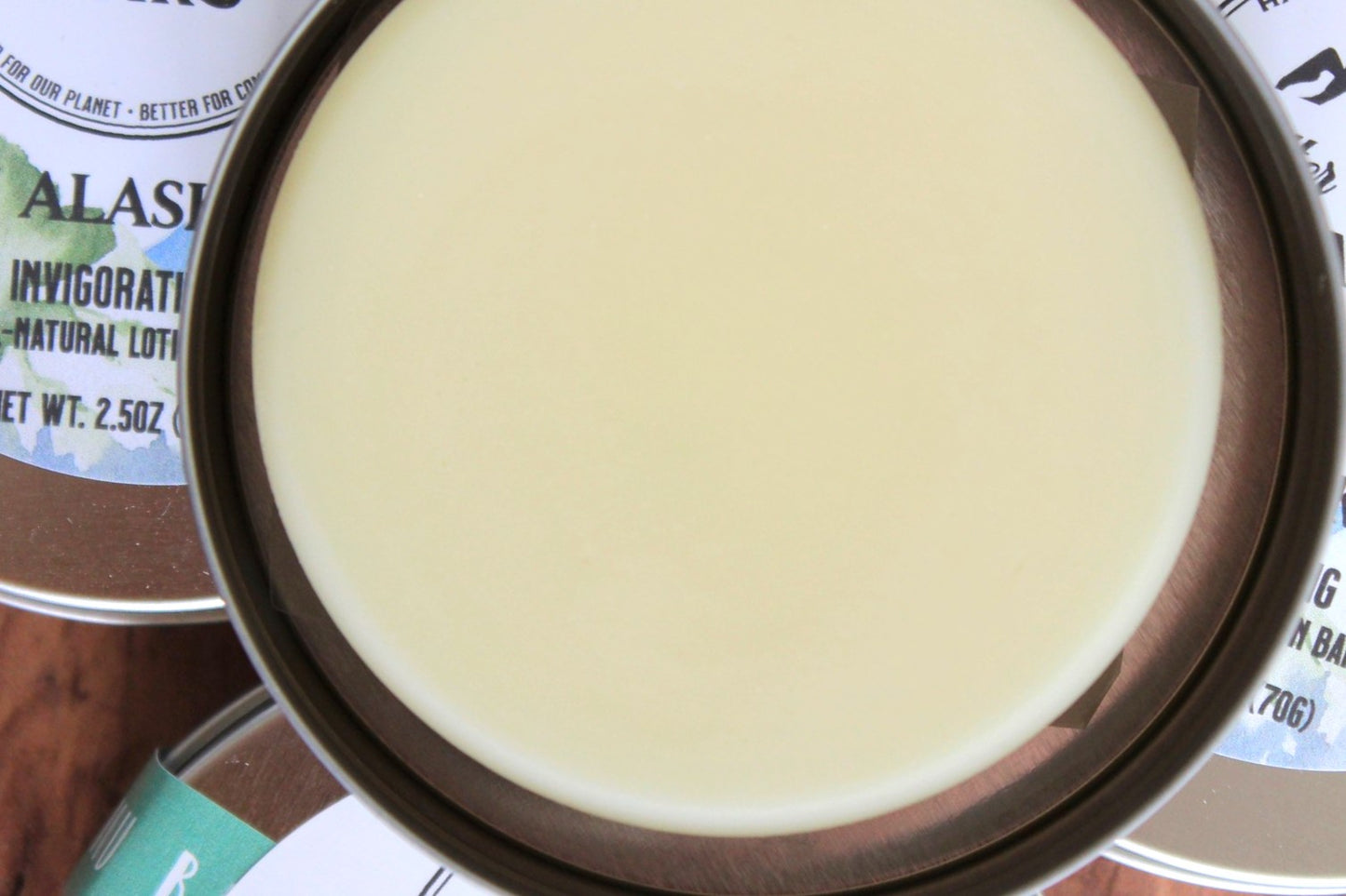 Shea butter lotion bar in silver tin.