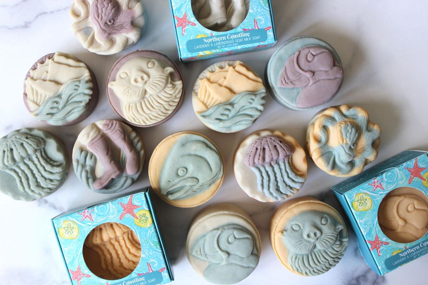 Alaska made soap in shapes like otter, puffin, jellyfish, salmon, and mountains.