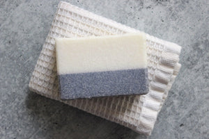 Alaskan Saltwater bar soap on a white wash cloth.