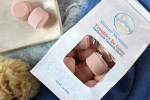 Aromatherapy shower steamers in scent Troubles Be Gone.