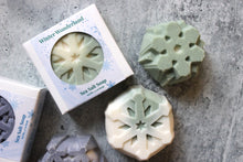 Load image into Gallery viewer, Coconut Oil and Sea Salt Snowflake Soaps in Winter Wonderland green.  Pictured in and out of white boxes.
