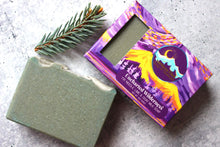 Load image into Gallery viewer, Fir needle, lime and goat milk soap in a purple box with golden mountains. 
