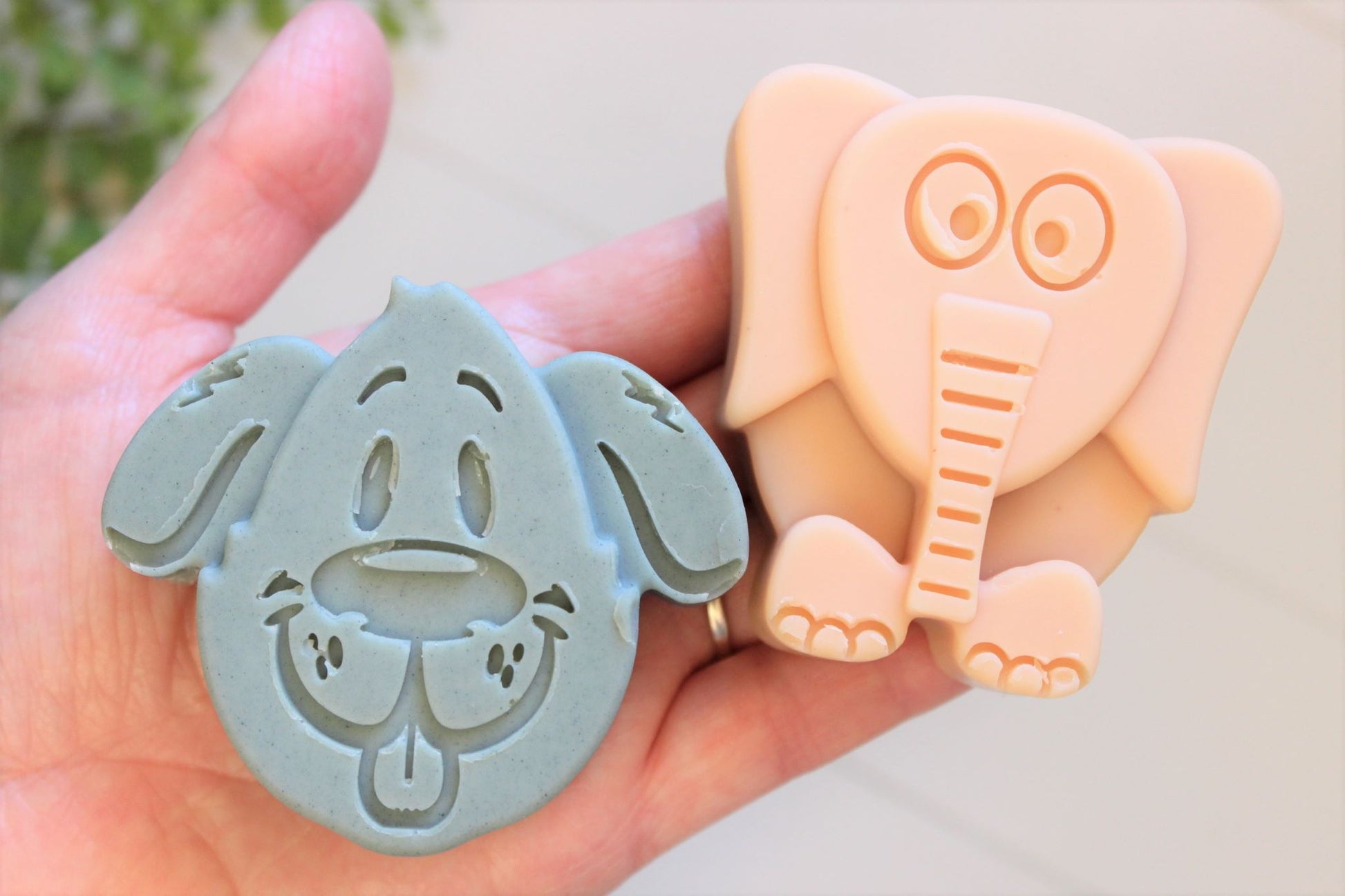 Goat milk soap for kids in the shape of a dog and elephant.