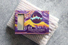 Load image into Gallery viewer, Lavender, lemon and sage soap in a purple box.
