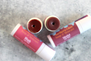 Natural Lip and Cheek Tints in Blush and Merlot.