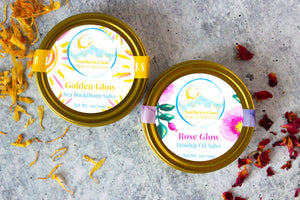 Natural salves by Northern Glow Soap and Skincare.  Golden Glow and Rose Glow are in golden tins.