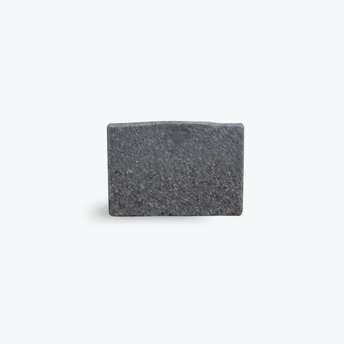 Charcoal and exfoliating coffee soap with a white background.