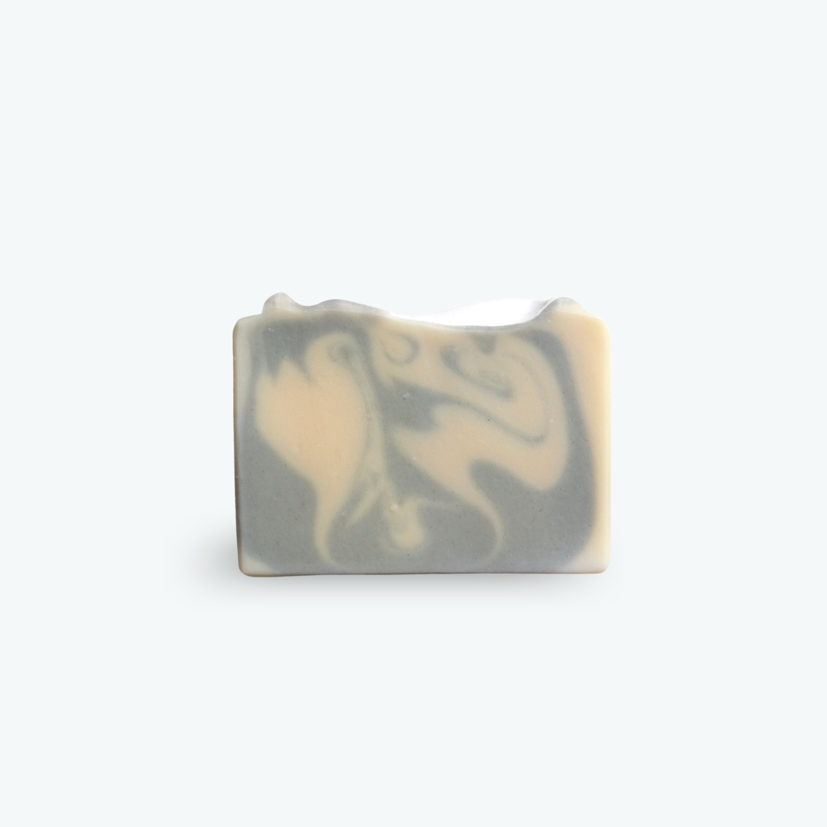 Mild olive oil and lavender soap, with swirls of gray / blue, on a white background.