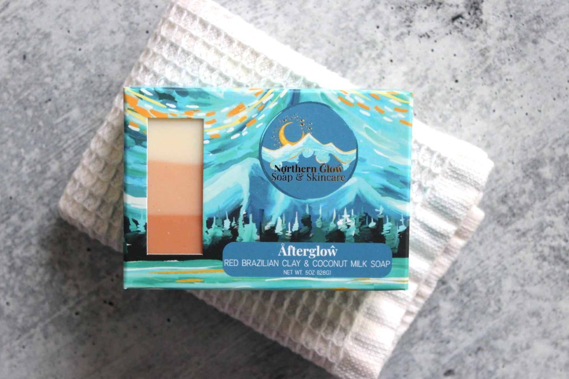 Northern Glow Soap Red Clay & Shea Butter Bar Soap, For Natural Cleansing on a white washcloth