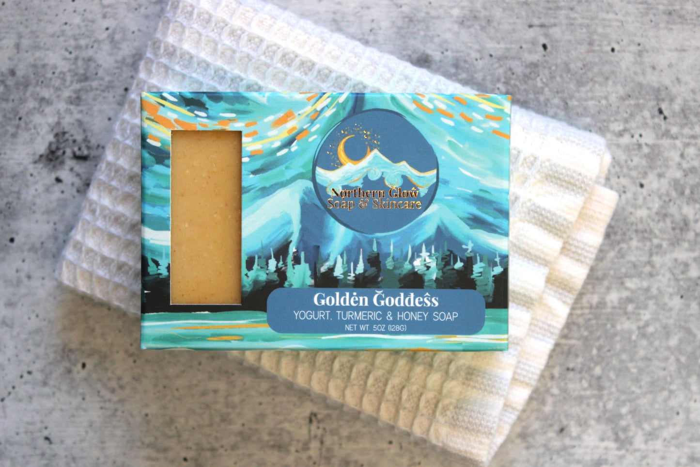 Turmeric and Goat Milk Soap in a blue box.