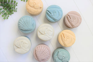 Alaskan Seaside Soaps, with puffins, scallops, salmon and sea otters in various colors.