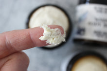 Load image into Gallery viewer, Natural Whipped Body Butter on a finger.
