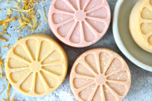 Simply The Zest soap slices clustered together.