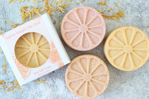 Pink Grapefruit soap called You're Simply The Zest.  Pink, orange and yellow soaps shaped like a slice of citrus.
